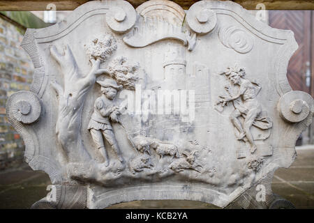 Ornaments, mouldings, gargoyle, low reliefs in a sandstone, granite, concrete. sculpting details in Gdansk (Danzig).  Mariacka street (Mariengasse) an Stock Photo