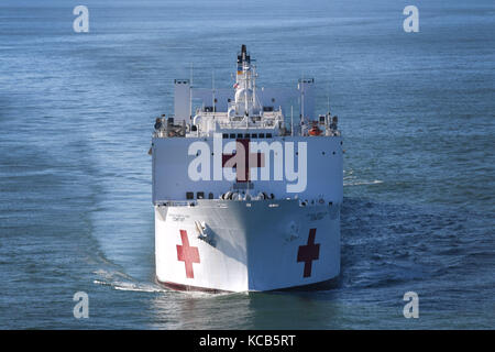 The Military Sealift Command hospital ship USNS Comfort (T-AH 20) arrives in San Juan, Puerto Rico, to provide humanitarian relief. Stock Photo