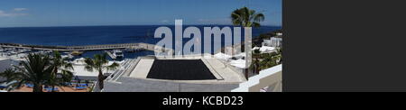 Views across Puerto del Carmen seafront and harbour, Lanzarote Stock Photo