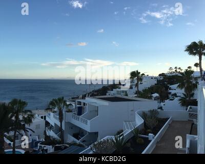 Views across Puerto del Carmen seafront and harbour, Lanzarote Stock Photo