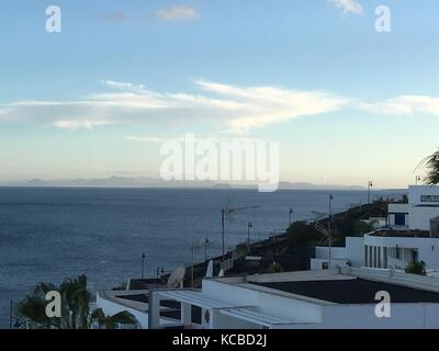 Views across Puerto del Carmen seafront and harbour, Lanzarote Stock Photo