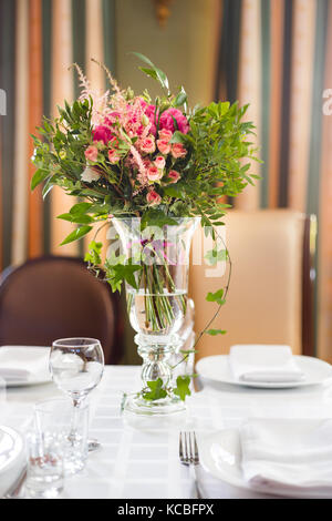 Flora on the holiday table. Bouquet of wildflowers Stock Photo