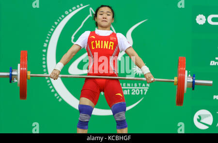 Ashgabat 2017 - 5th Asian Indoor & MartialArts Games 17-09-2017. Huiying Xiao (CHN) competes in the snatch competition Stock Photo