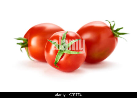 Three fresh ripe red tomatoes isolated on a white background Stock Photo