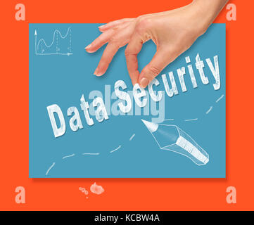 A hand picking up a Data Security concept on a colorful drawing board. Stock Photo