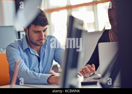 Freelance programmer working in startup office Stock Photo