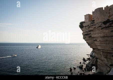 Houses on steep cliff with overhang in Bonifacio, Island of Corsica, France Stock Photo