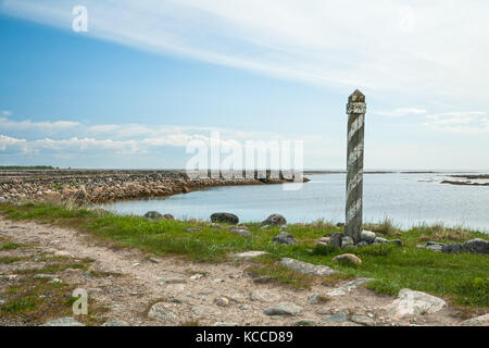 Milepost on the road to Muksalma, Solovetsky Islands, Russia Stock Photo