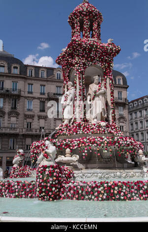 LYON, FRANCE, May 29, 2015 : The World Festival of Roses (Festival Mondial des Roses) takes place in Lyon from May to October. Places and fountains of Stock Photo