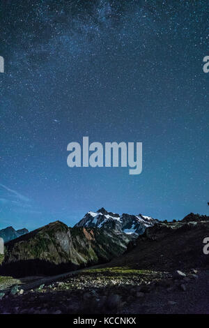 A star-filled sky over Mount Shuksan, North Cascades National Park, Washington, USA. Stock Photo