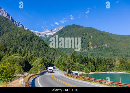 Truck with camping trailer on North Cascades Highway Route 20 in North Cascades National Park in Northwest Washington State Stock Photo