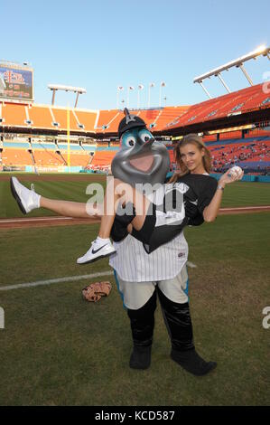 MIAMI, FL - JUNE 10: (EXCLUSIVE COVERAGE) International Super Model and actress Joanna Krupa throws out first pitch at Dolphins Stadium for the Florida Marlins baseball game. Joanna Krupa will also star on the upcoming show ' The Superstars'  that will air on June 23, 2009 on ABC. 2008 Joanna has been been featured as one of the world sexiest women for the 'Sexiest People' series on E! channel ( syndicated worlwide).Parallel she has been developing shows, scoring high at poker tournaments and devoting herself to the fight for animal rights.   Joanna’s popularity has soared over the recent year Stock Photo