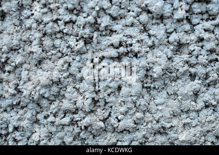 Texture of rough plastered gray wall. Grungy plaster wall texture background. Stock Photo