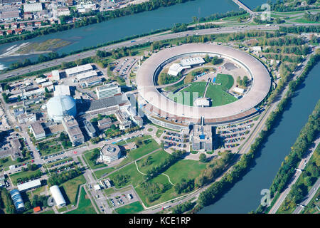AERIAL VIEW. The European Synchrotron Radiation Facility, a research facility at the confluence of the Drac and the Isère River. Grenoble, France. Stock Photo