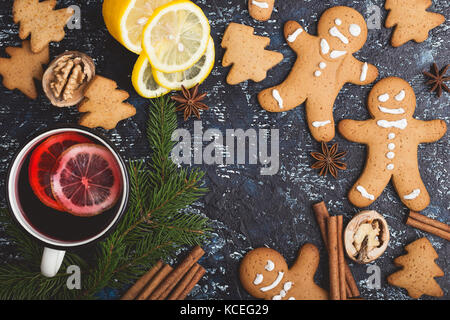 Mulled wine with lemon slices in white rural mug  on rustic table , top view Stock Photo