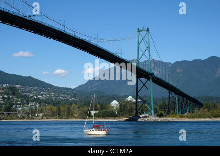 The Lions Gate Bridge across the narrows of Burrard Inlet in Vancouver, British Columbia, Canada. The bridge opened in 1938 and connects the City of V Stock Photo