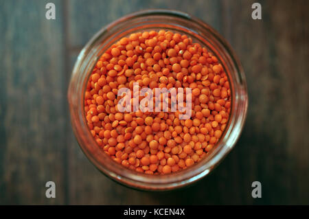 Orange lentils in a glass Stock Photo