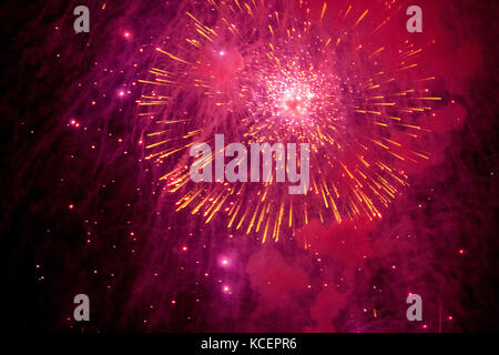 fireworks explosions in the night sky. Close-up. Stock Photo