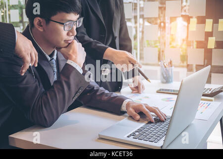 businessteam looking at report and having a discussion in office. business concept. Stock Photo