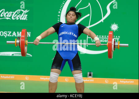 Ashgabat 2017 - 5th Asian Indoor & MartialArts Games 24-09-2017. Weightlifting womens 90kg - Dolera Davronova (UZB) competes in snatch Stock Photo