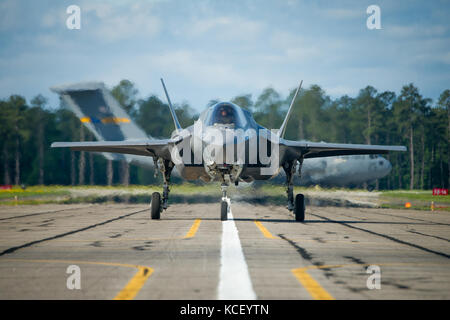 U.S. Marine Corps Maj. Brian Bann, a pilot assigned to VMFAT-501 at Marine Corps Air Station Beaufort, arrives in a F-35B Lightning II for the South Carolina National Guard Air and Ground Expo at McEntire Joint National Guard Base, South Carolina, May 5, 2017. This expo is a combined arms demonstration showcasing the abilities of South Carolina National Guard Airmen and Soldiers while saying thank you for the support of fellow South Carolinians and the surrounding community. (U.S. Army National Guard photo by Sgt. Brian Calhoun) Stock Photo
