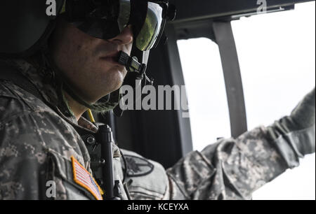 U.S. Army Soldiers with the South Carolina National Guard and guest aviators arrive to McEntire Joint National Guard Base and perform rehearsal operations in preparation for the South Carolina National Guard Air and Ground Expo, May 05, 2017, Eastover, S.C. The event includes civilian and military performers, aircrafts on static display, and a combined-arms demonstration showcasing some of the tactical capabilities of the South Carolina National Guard and its equipment. (U.S. Army National Guard photo by Staff Sgt. Roberto Di Giovine/Released) Stock Photo