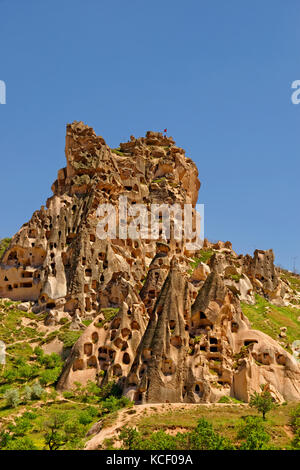 Cave dwellings known as Uchisar Castle at Uchisar in the Goreme National Park, Cappadocia, Turkey. Stock Photo
