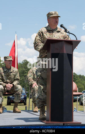 The 59th Troop Command, South Carolina Army National Guard, conducts a change of command ceremony at McEntire Joint National Guard Base in Eastover, South Carolina, June 10, 2017. Outgoing commander U.S. Army Col. Robert Carruthers relinquished command to U.S. Army Lt. Col. Timothy Wood with U.S. Army Maj. Gen. Robert E. Livingston, Jr., the adjutant general for South Carolina, officiating the ceremony. The event also recognized a change of responsibility for the highest ranking non-commissioned officer in the 59th Troop Command, where outgoing Command Sgt. Maj. Chet Welch transferred responsi Stock Photo