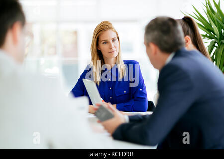 Succeful business partners brainstormin Stock Photo