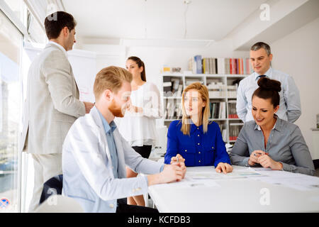 Succeful business partners brainstormin Stock Photo