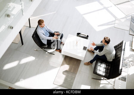 Business people discussing ideas Stock Photo