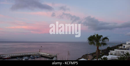 Views across Puerto del Carmen seafront and harbour, Lanzarote Stock Photo