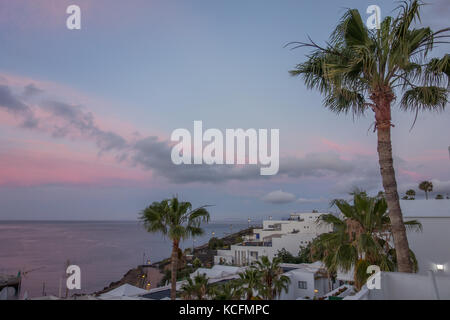 Views across Puerto del Carmen seafront and harbour, Lanzarote Stock Photo