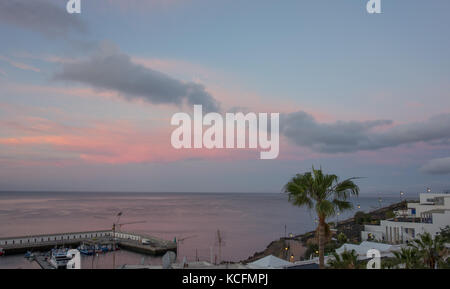 Views across Puerto del Carmen seafront and harbour, Lanzarote Stock Photo