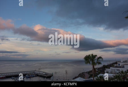 Views across Puerto del Carmen seafront and harbour, Lanzarote Stock Photo