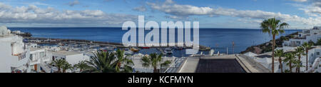 Views across Puerto del Carmen seafront and harbour, Lanzarote Stock Photo