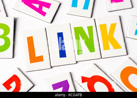 word link made of colorful letters on white background Stock Photo