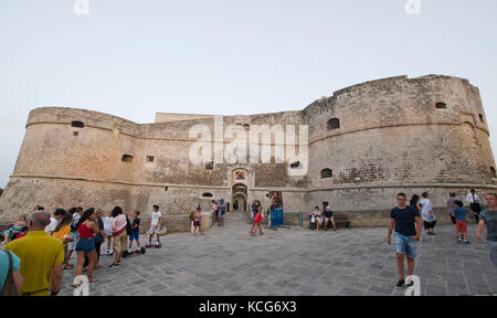 OTRANTO, ITALY -  JULY  24, 2017:  people in front of the De Monti Castle of Corigliano d'Otranto, often used for exhibitions and event Stock Photo
