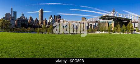 Summer panoramic view of the Cornell Tech campus on Roosevelt Island with the Queensboro Bridge. New York City Stock Photo