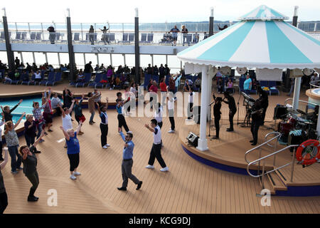 on board entertainment on the Norwegian Pearl cruise ship, USA Stock Photo
