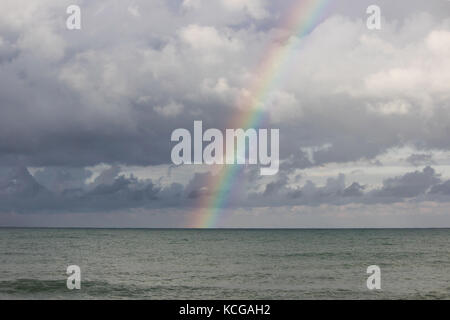 A rainbow going down on the Black Sea. Stock Photo