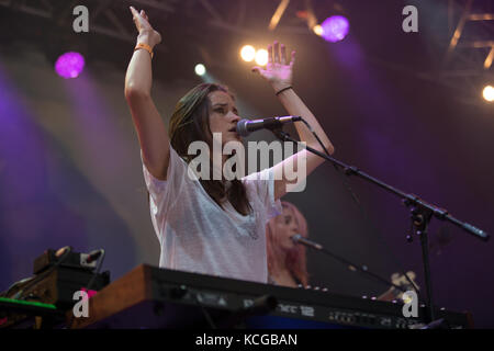 The American indie rock band Warpaint originates from Los Angeles and is here pictured at a live concert at the Avalon stage at the Danish music festival Roskilde Festival 2014. Here singer, songwriter and musician Theresa Wayman is pictured live on stage. Denmark, 04/07 2014. Stock Photo