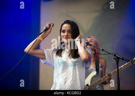 The American indie rock band Warpaint originates from Los Angeles and is here pictured at a live concert at the Avalon stage at the Danish music festival Roskilde Festival 2014. Here singer, songwriter and musician Theresa Wayman is pictured live on stage. Denmark, 04/07 2014. Stock Photo