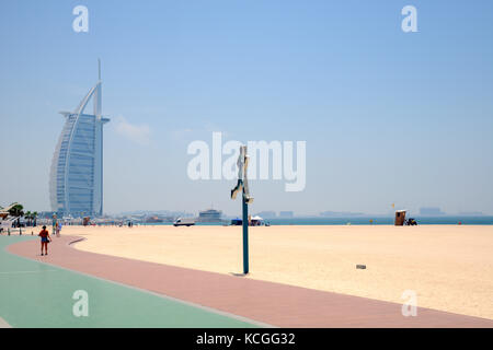 Running track along the ocean in Dubai, United Arab Emirates, next to the Burj Al-Arab luxury hotel Stock Photo