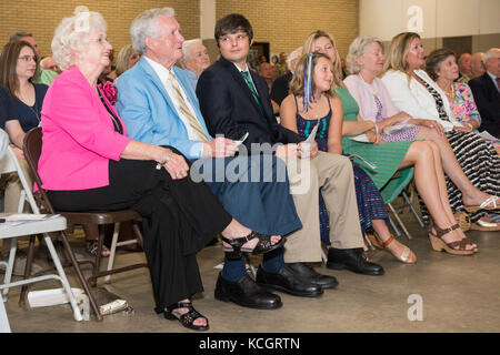 Friends and family members look on during the promotion ceremony for U.S. Army Col. Jeffrey A. Jones, assistant adjutant general for Army in the South Carolina National Guard, promoted to the rank of Brig. Gen. at the South Carolina National Guard's Joint Forces Headquarters building in Columbia, South Carolina, July 8, 2017.  Jones is responsible for monitoring the state's Army National Guard readiness and training and also serves as the dual status commander during military support to civil authority’s missions. (U.S. Army National Guard photo by Sgt. Brian Calhoun) Stock Photo