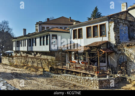 Old Houses near the river and main Street in Melnik town, Blagoevgrad region, Bulgaria Stock Photo