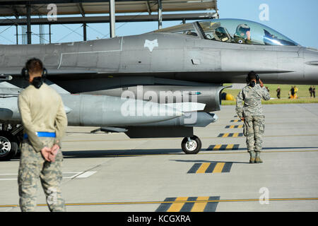 U.S. Airman Donovan Jackson, a crew chief with the South Carolina Air National Guard’s 169th Aircraft Maintenance Squadron at McEntire Joint National Guard Base, launches an F-16 Fighting Falcon fighter jet to relocate in preparation for Hurricane Irma’s potential impact, Sept. 9, 2017. Hurricane Irma peaked as a Category 5 hurricane in the Atlantic Ocean and is projected to impact parts of S.C. (U.S. Air National Guard photo by Master Sgt. Caycee Watson) Stock Photo