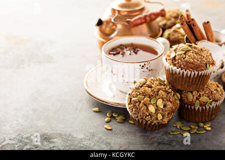 Healthy pumpkin muffins with tea and spices Stock Photo