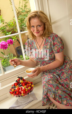 Food writer Xanthe Clay in her house in Bristol. Stock Photo