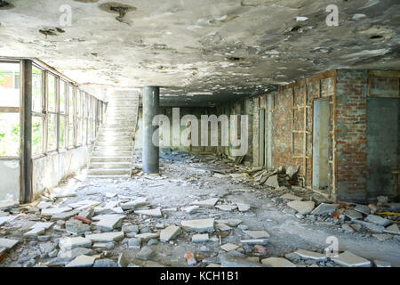 An old obsolete abandoned building that used to be a hotel in Kupari, Croatia. Stock Photo
